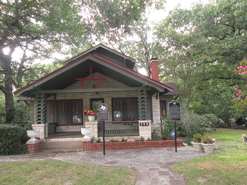 Gilbert house with signs